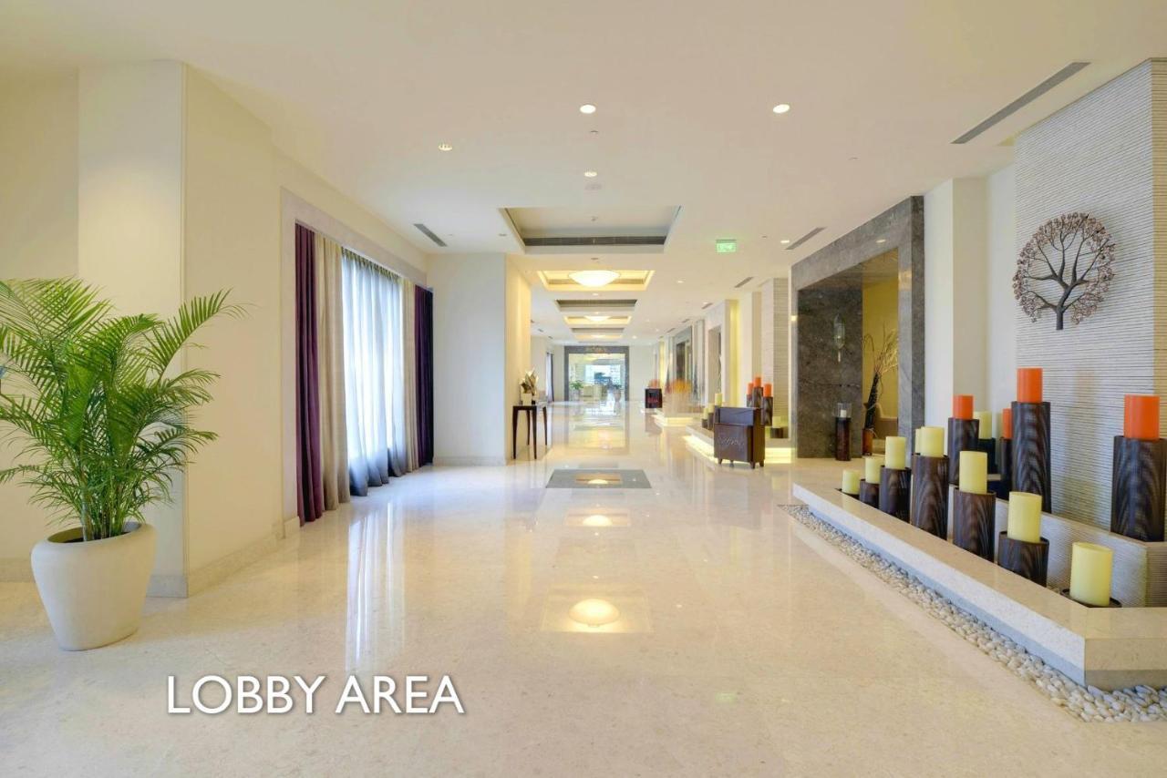Отель Radisson Blu Bengaluru Outer Ring Road Экстерьер фото